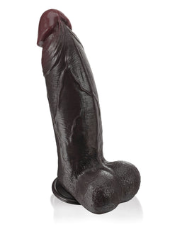 11 inch black dildo with a thick veiny shaft and pronounced head, side view