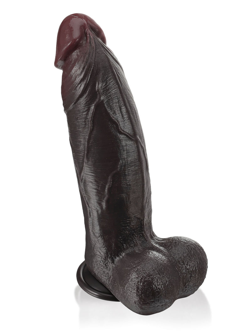 11 inch black dildo with a thick veiny shaft and pronounced head, side view