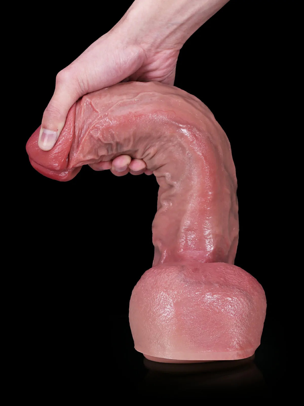 12 inch flesh dildo with bendable core posed to a custom angle