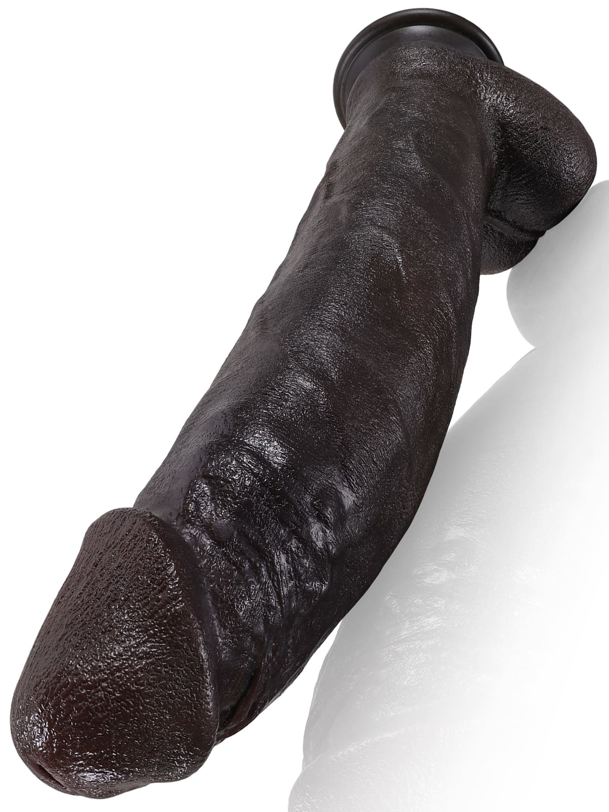 12 inch curved extra-large black dildo shown full length