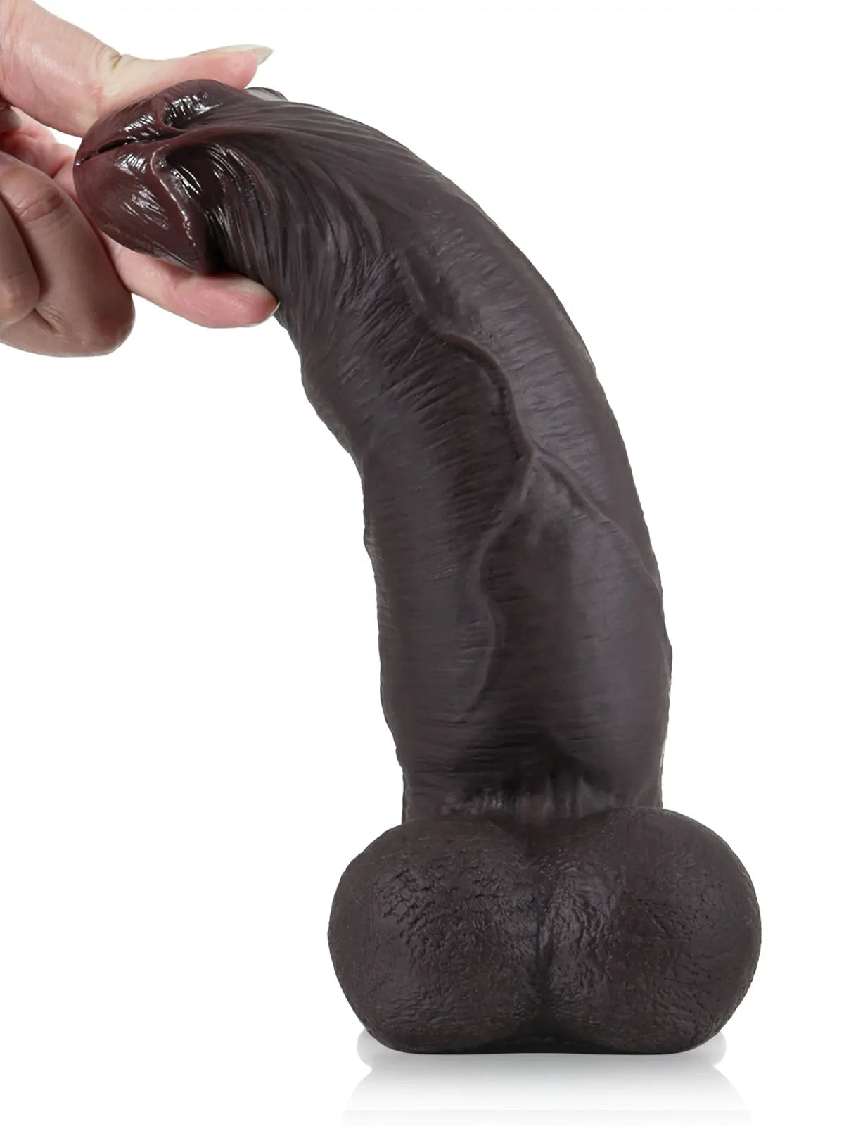 Big black 9 inch dildo held in hand to show its size and veins
