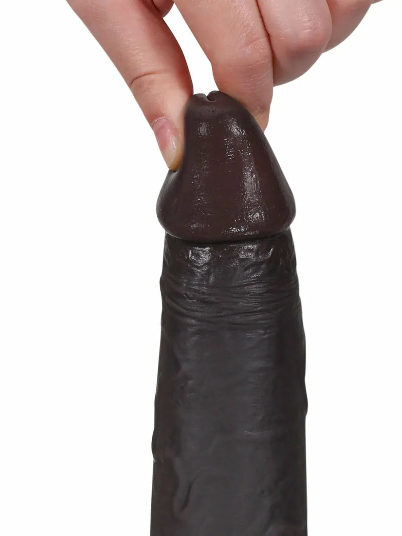 Close-up of black cyberskin dildo glans and skin detail