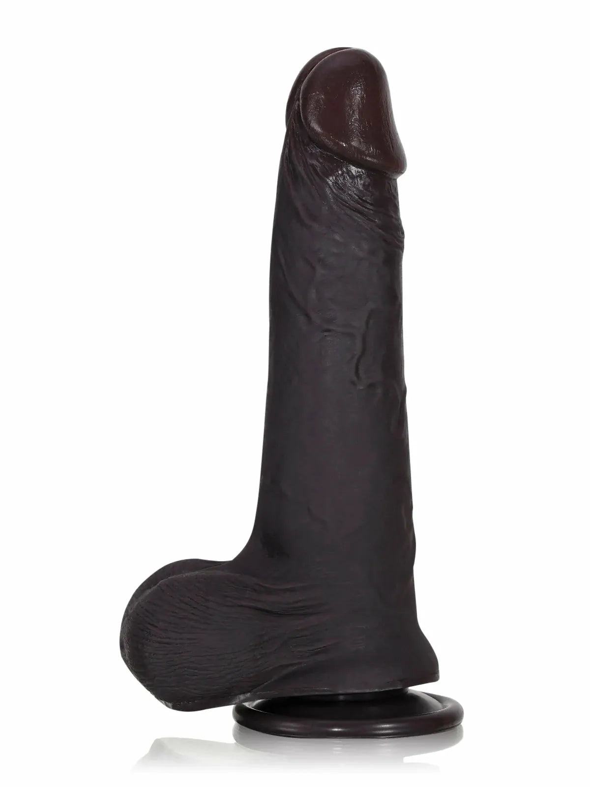 Profile view of black realistic cyberskin dildo and suction base