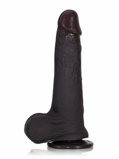 Profile view of black realistic cyberskin dildo and suction base