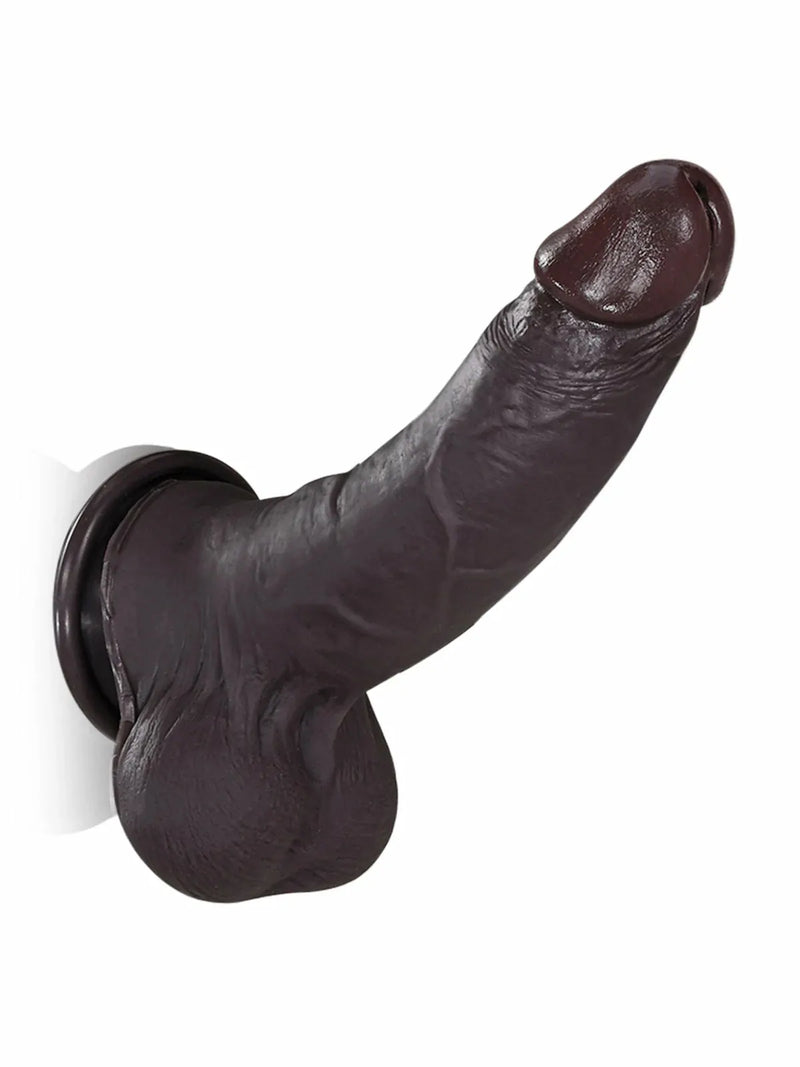 Black realistic skin dildo displayed from an angled view