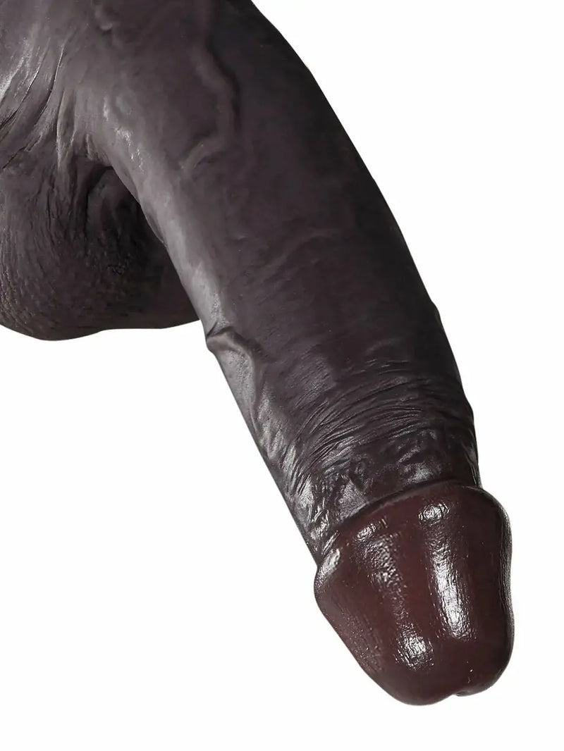 Detailed texture view of black realistic skin dildo surface