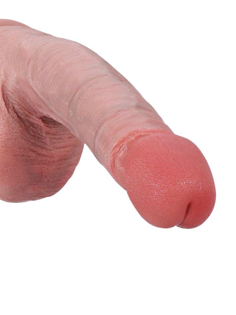 Flesh dildo with a flared mushroom head and upward curve, side view