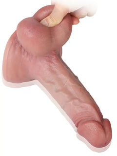 Realistic flesh dildo with a defined ridge and veins, angled view