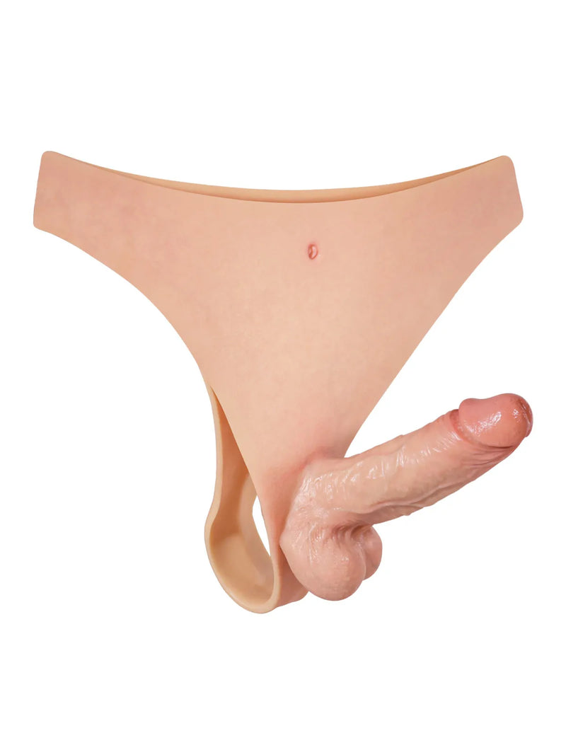 Flesh strap-on dildo attached to its built-in thong harness